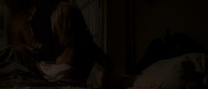 Katherine is laying next to some guy topless, unfortunally the scene is qui...