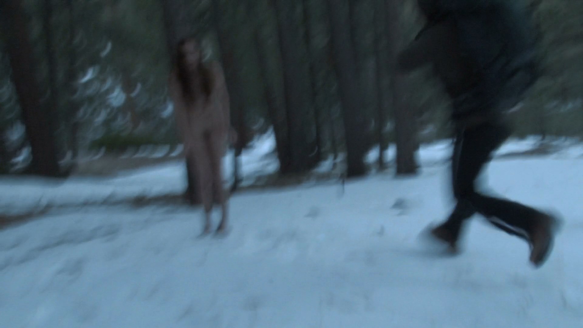 Danielle Lozeau is walking around the snow fully naked. 