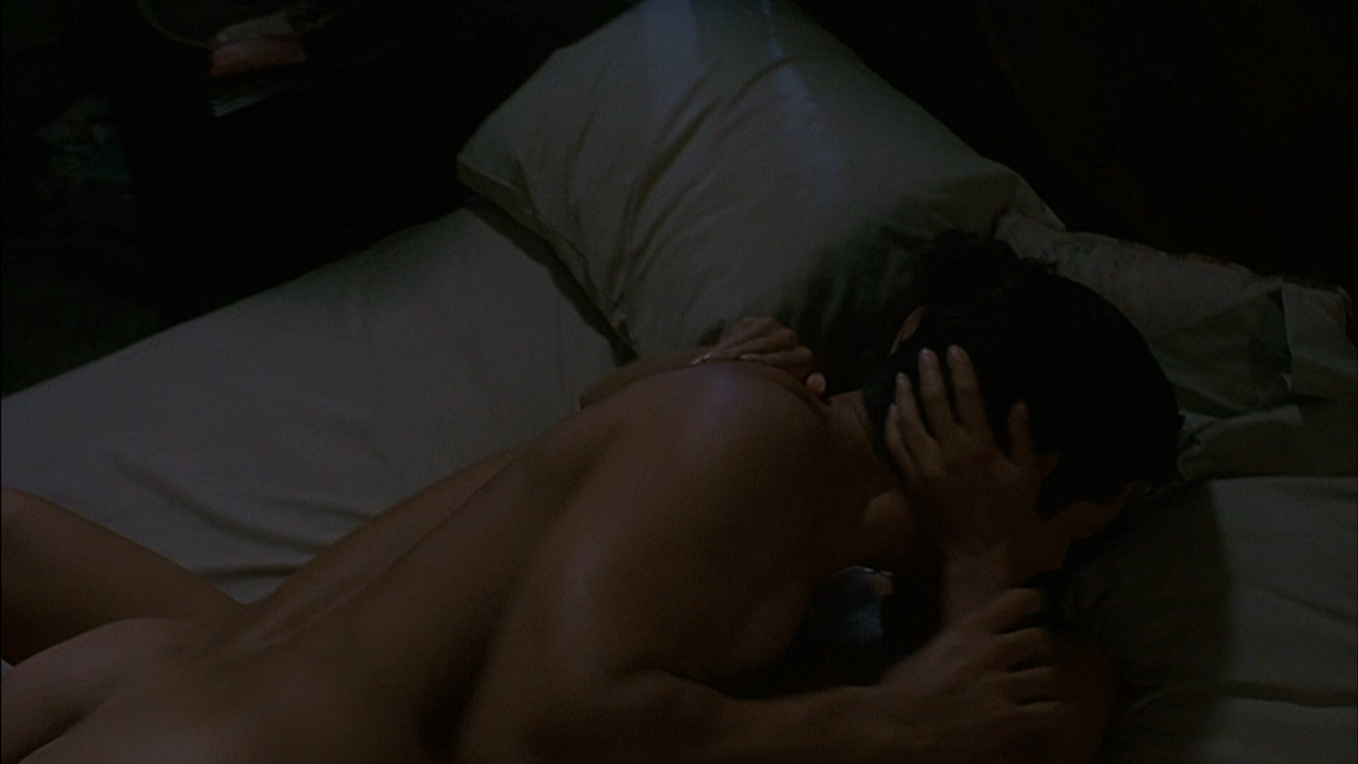Jennifer Beals is having sex with some guy. 