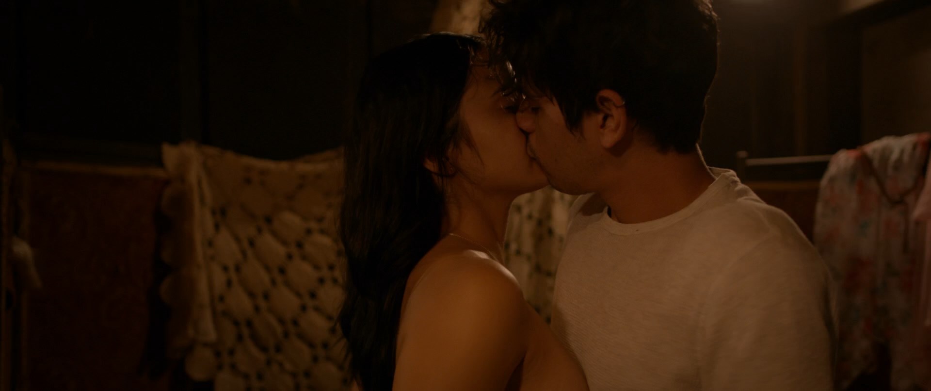 Camila Mendes is making out with some guy. 
