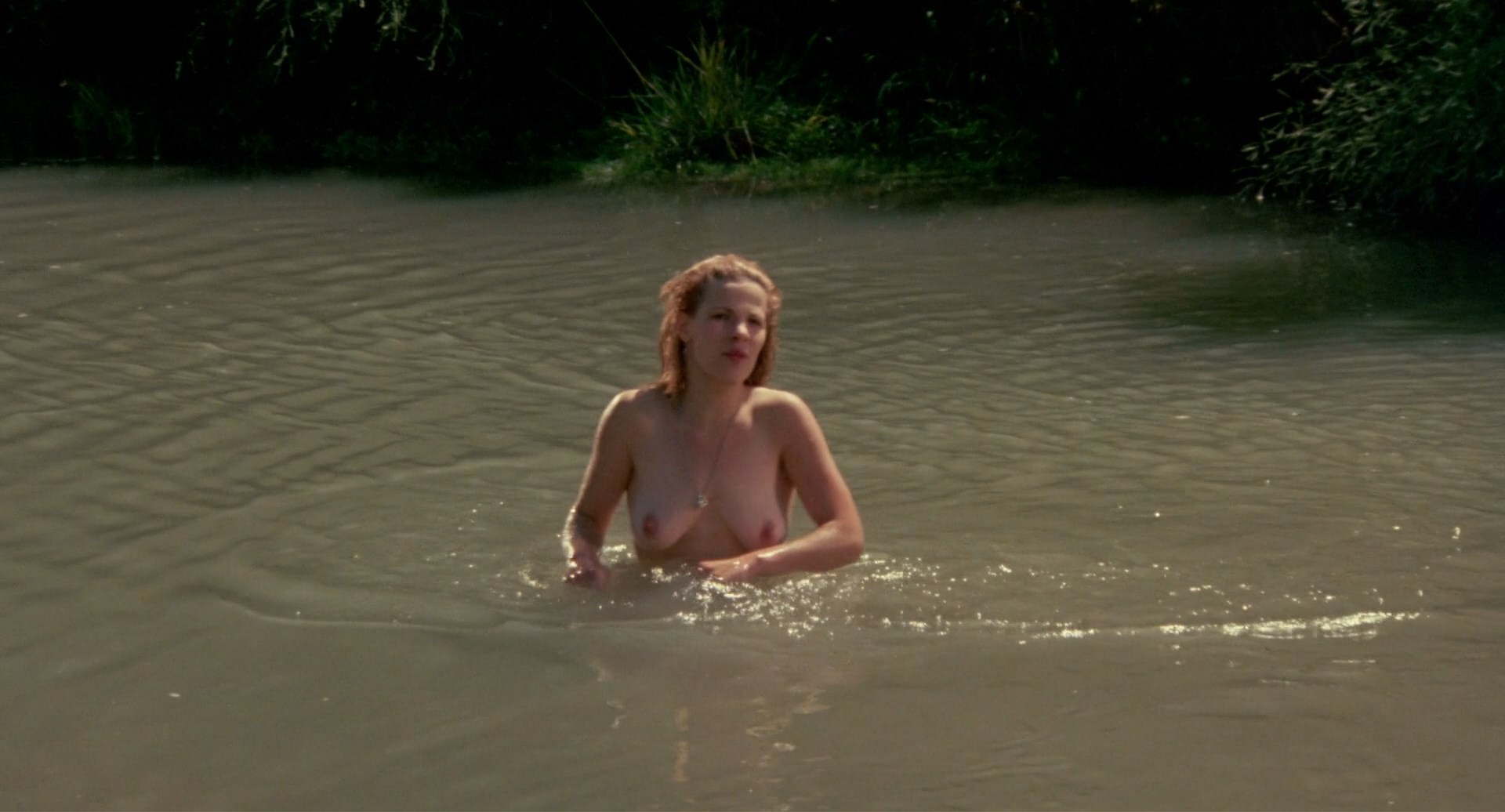 Lili Taylor is swimming topless while two dudes ogle her Members Download L...