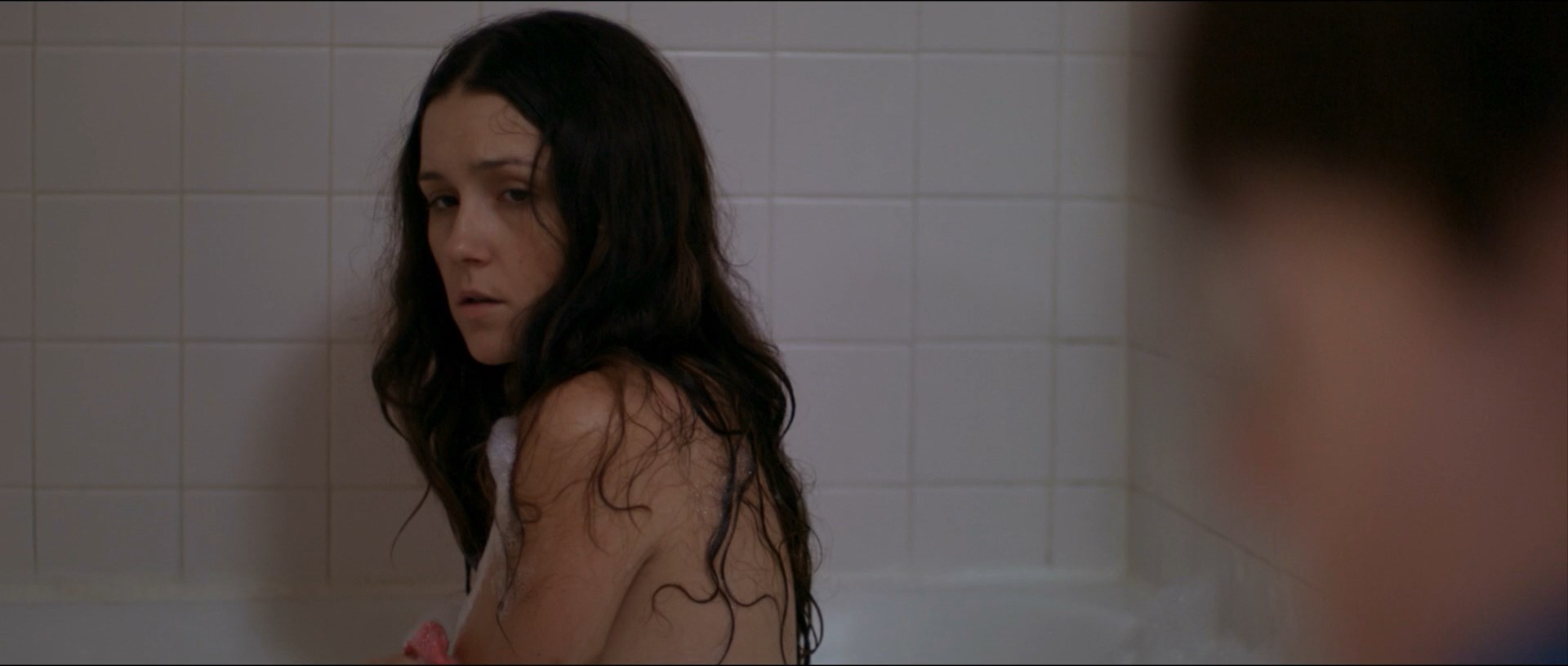 Shannon Woodward is taking a bath, no nudity tho.