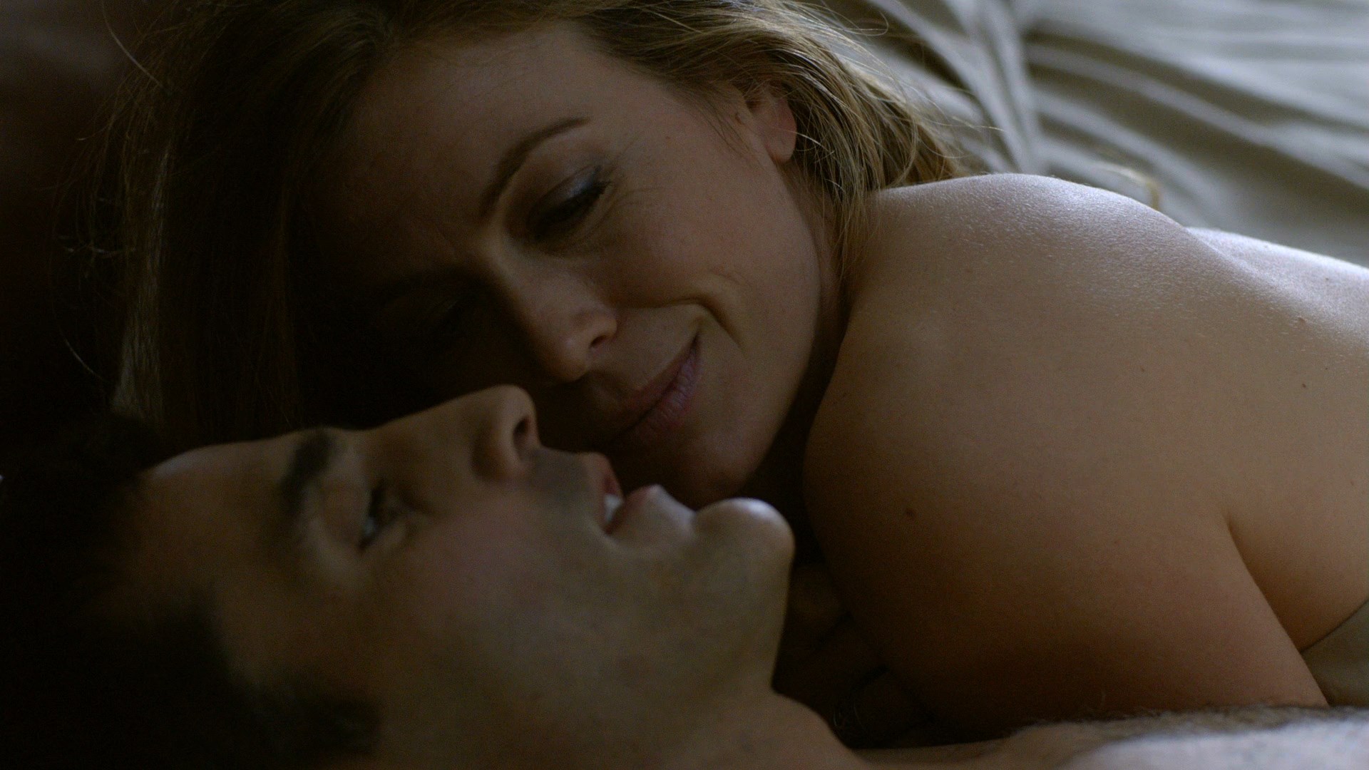 Sonya Walger is laying next to some guy in this very long scene. 