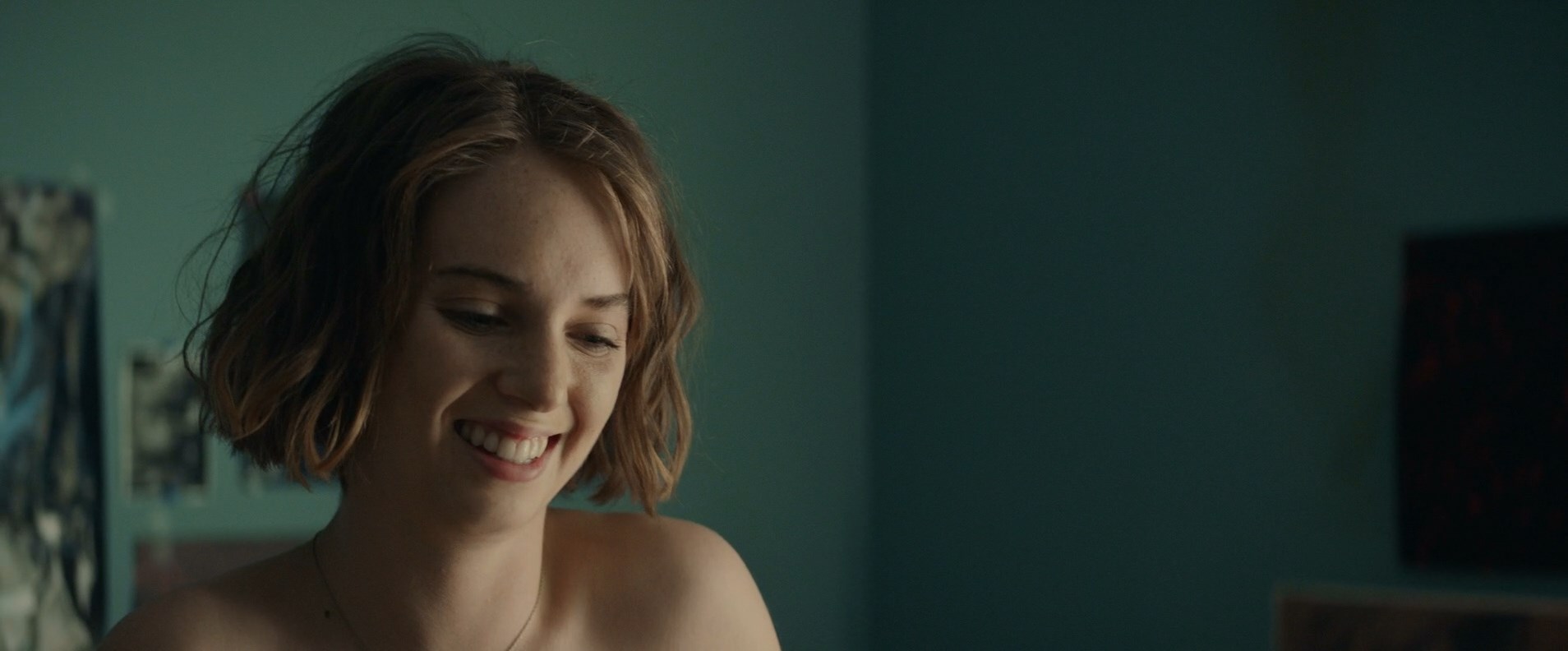 Maya Hawke makes out with some guy, her right boob is out from the shirt. 