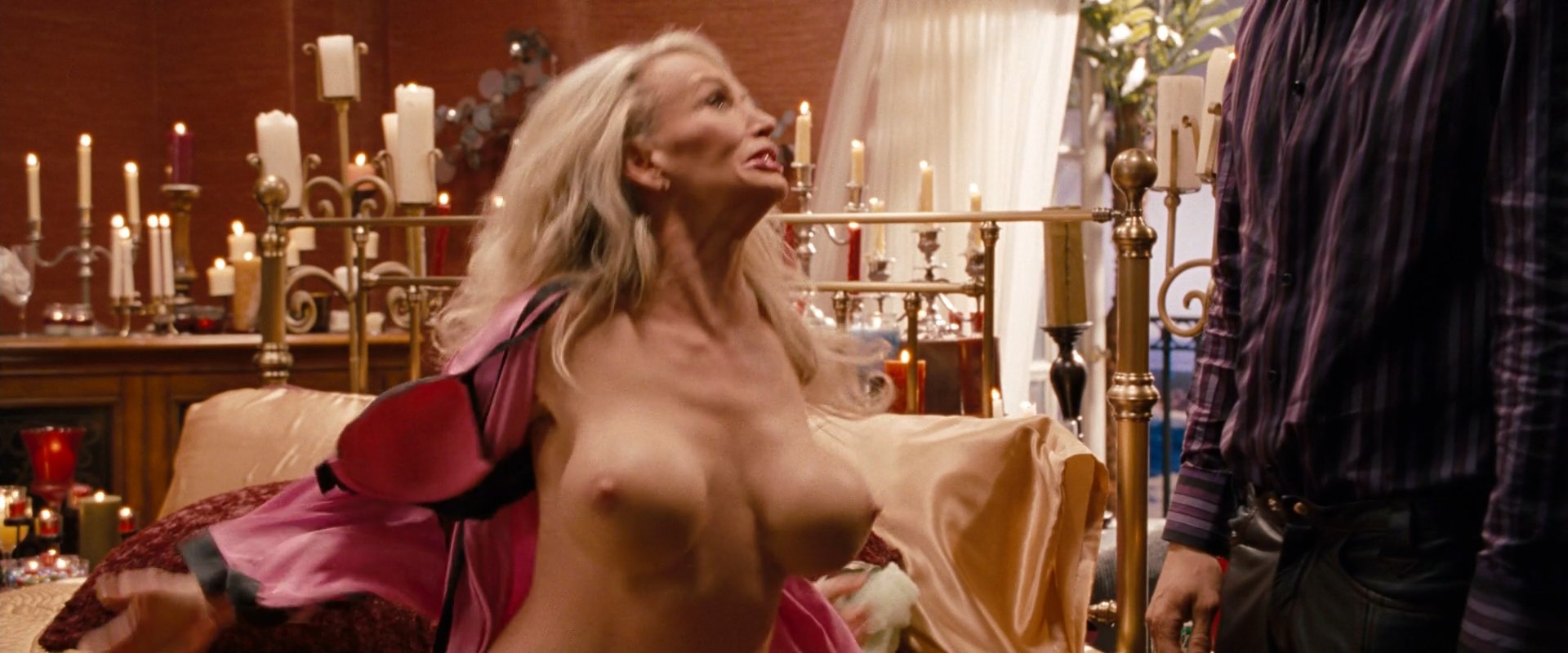 Taaffe O’Connell shows her huge tits while filming a scene with Deadpool.