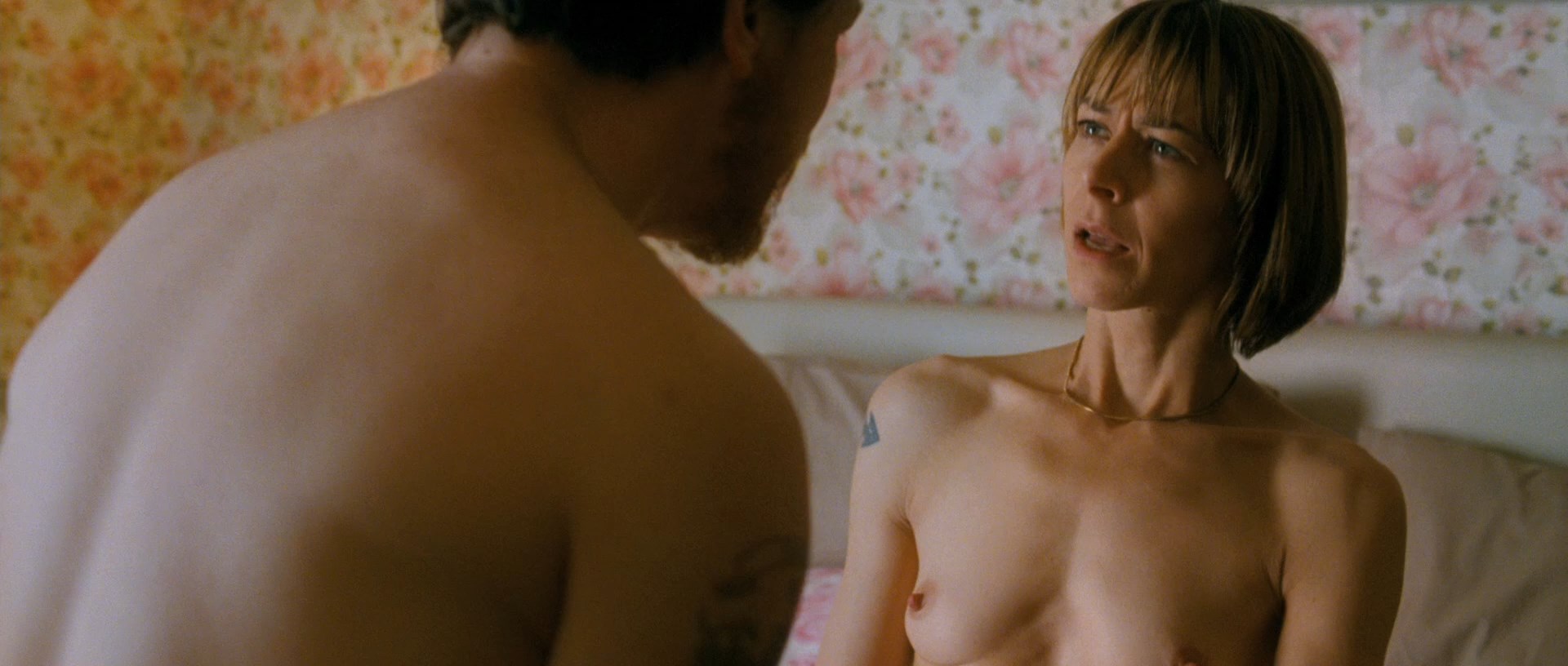 Short scene where Kate Dickie shows her tits while getting nailed from behi...