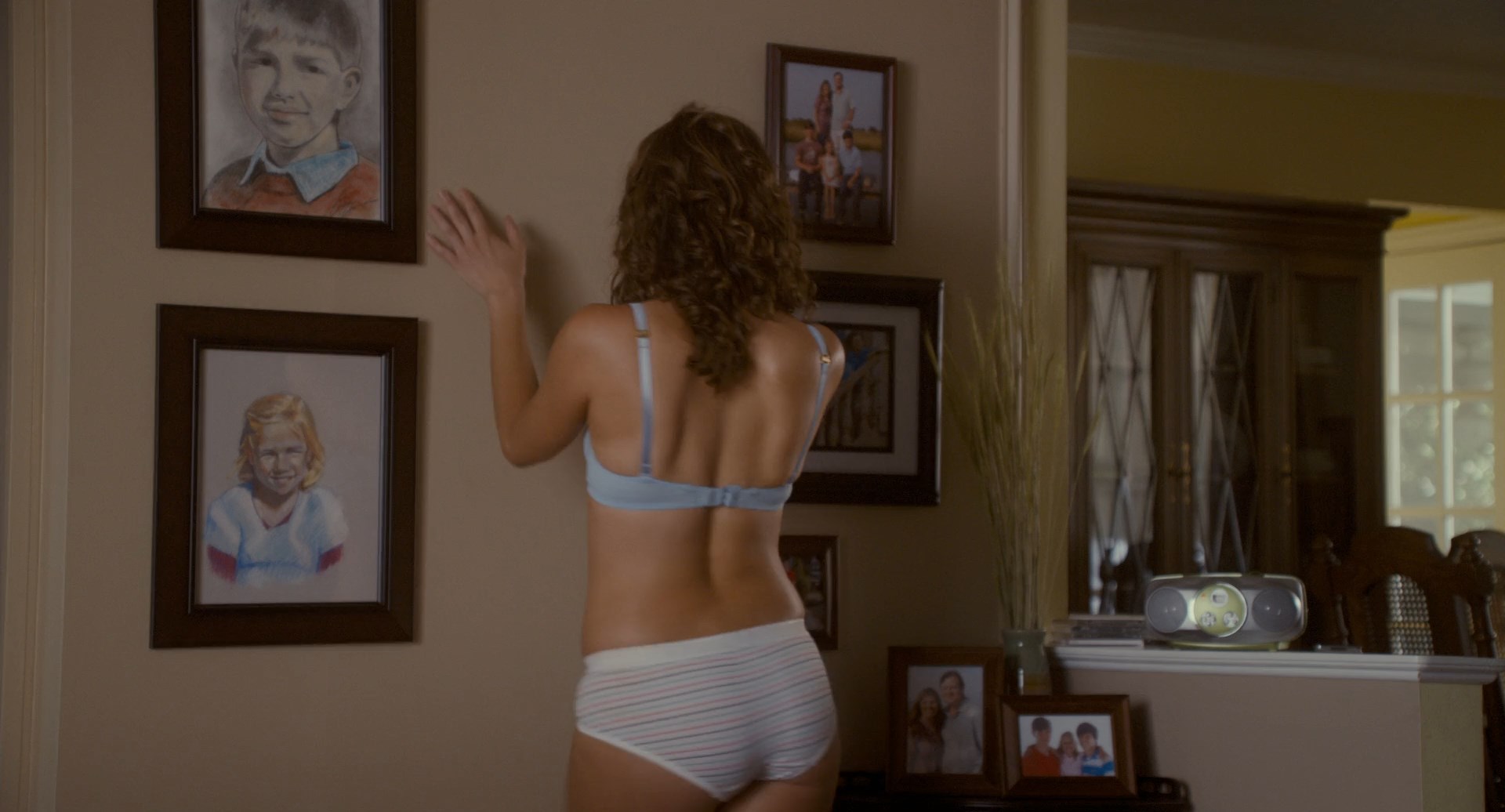 Rebecca Hall is dancing around in underwear.