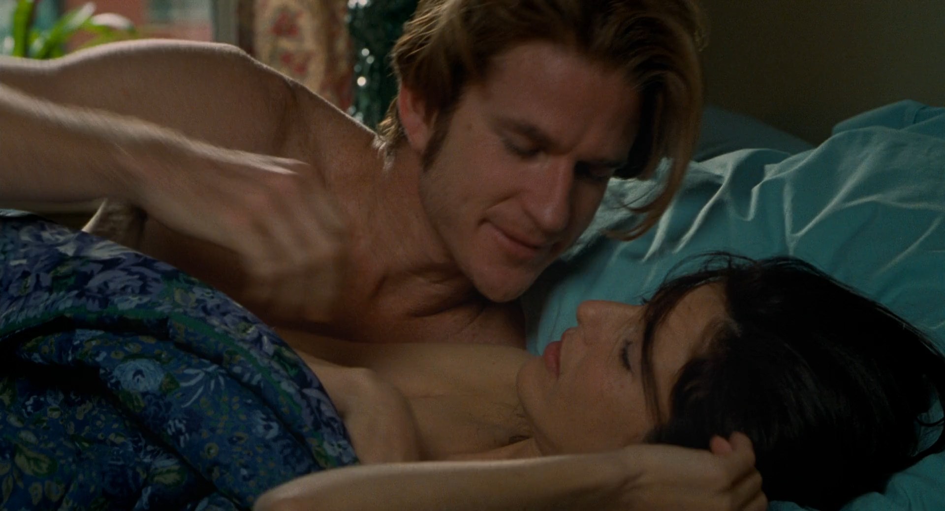 Catherine Keener shows her tit before she gets up from the bed and is cover...
