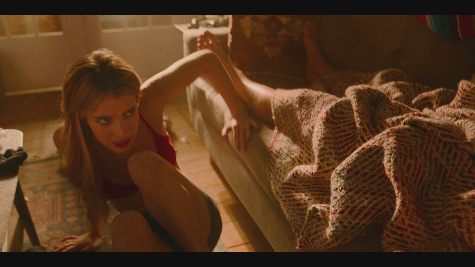 Emma Roberts wakes up from the floor wearing red bra and boxers 