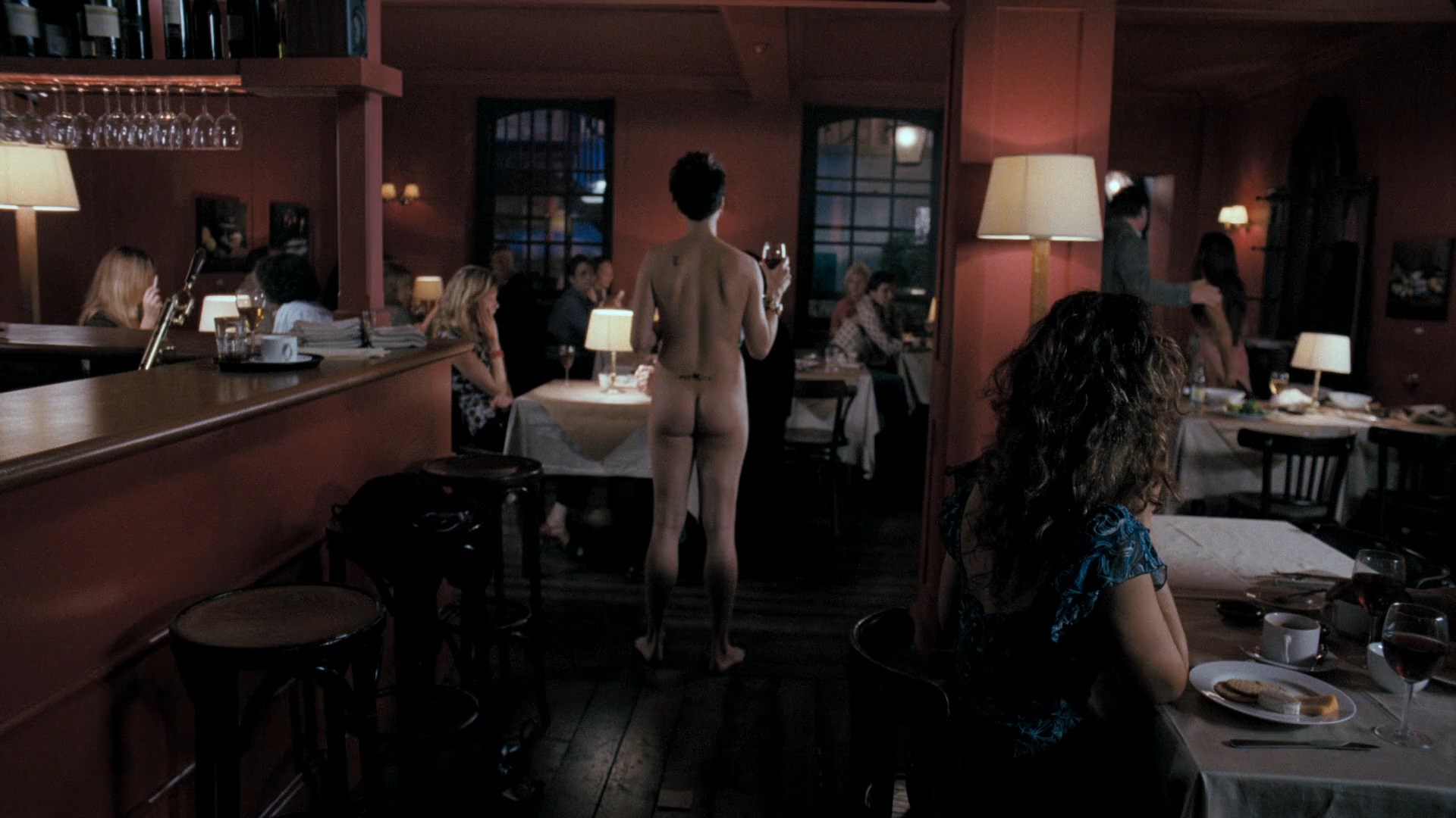 Neve Campbell strips naked in the middle of a restaurant and starts ranting...